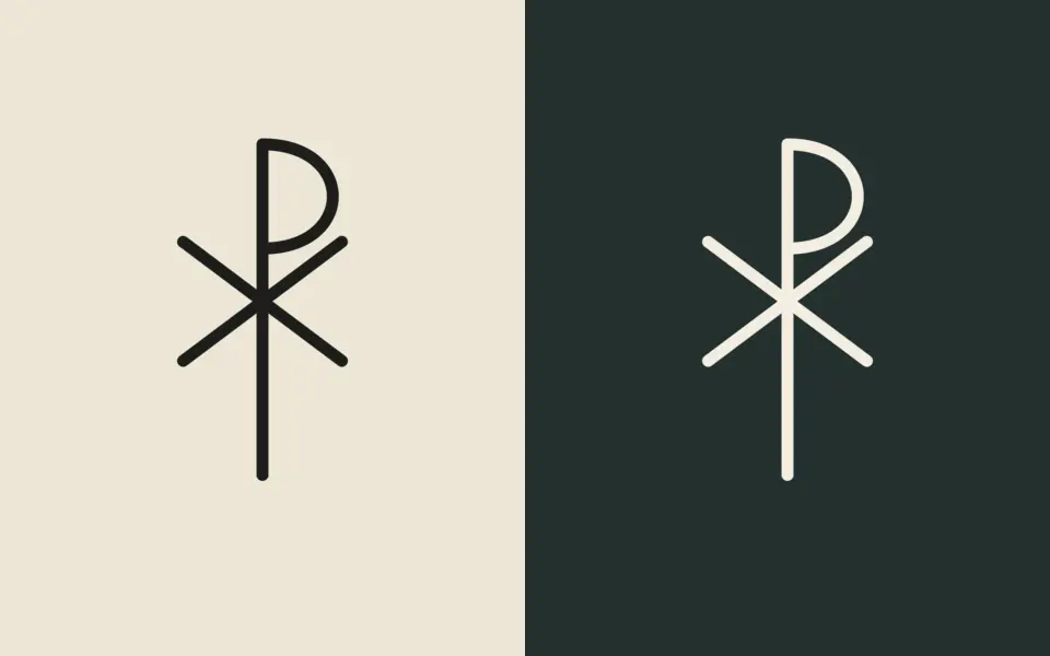 Chi-Rho, single line design shown twice: dark ink on a cream background and cream ink on a dark green background